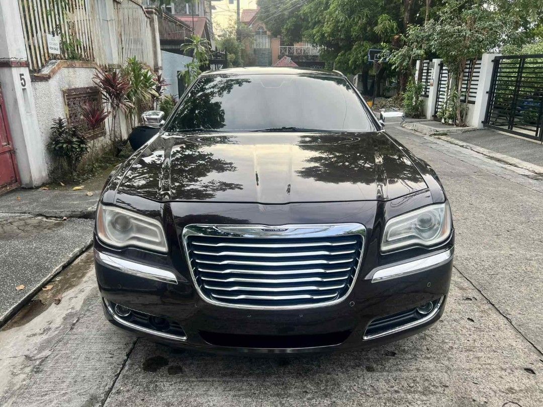 Chrysler 300C 3.6L V6 Auto (Category: Used Cars) located in Cebu City. Submitted by coy_888 (Listing ID 1468645262, Image 1). Description: 2013 Chrysler 300C V6 3.6L engine Automatic transmission All power Leather beige interior '10 touchscreen headunit LED headlights and foglights '22 Enkei mags new tires new headlights new tail lighs Cool AC for inquiries macoy 0945 4995385.