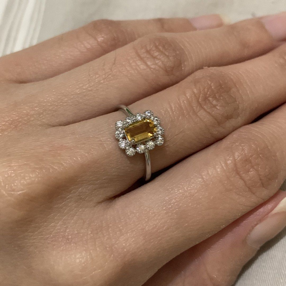 Citrine gemstone Adjustable Ring (Category: Rings) located in Quezon City. Submitted by itscxyy (Listing ID 1468347228, Image 3). Description: - Not S925 - Adjustable Ring band - Design: Classic cluster style featuring an emerald-cut citrine gemstone - Accents: Sparkling halo of small cubic zirconia stones - Perfect for everyday wear or gifting .