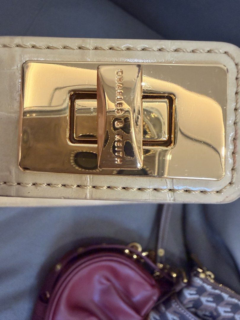 C&K CROC EFFECT MOON BAG (Category: Shoulder Bags) located in Pasay City. Submitted by breychelle20562 (Listing ID 1468522170, Image 3). Description: Charles and Keith croc effect moon bag Unused Condition 2023 Purchased.