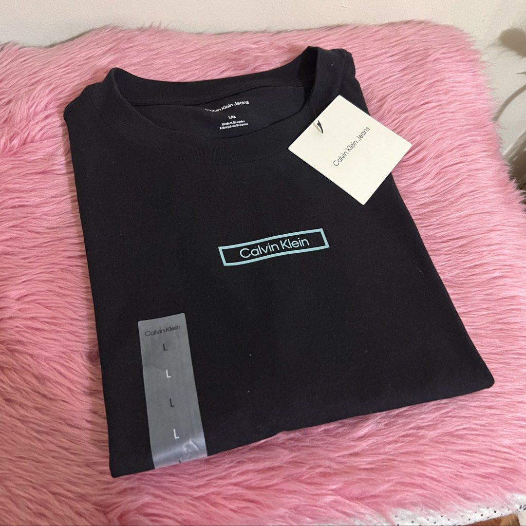 CK women’s shirt (Category: Shirts) located in Quezon City. Submitted by excessara.mnl (Listing ID 1467220531, Image 3). Description: 📌 W - 21 1/2” | L - 22”.