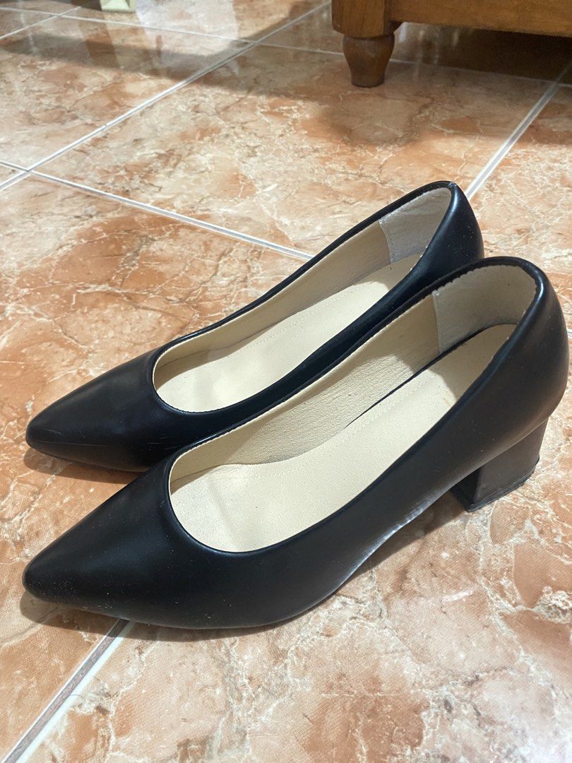 Classic Black Pointed Toe Chunky Block Heel Pumps (Category: Heels) located in Cabanatuan. Submitted by shans.gem (Listing ID 1468637018, Image 1). Description: - Style: Classic black pointed-toe pumps with a convenient slip-on design - Heel: Stable chunky block heel for all-day walking comfort - Interior: Light beige inner lining - Versatility: Ideal for work, office wear, and formal events - Condition: Clean exterior with minimal signs of wear.