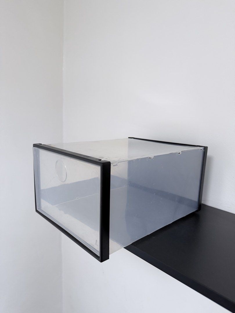 Clear Plastic Shoe Storage Box with Black Frame (Category: Storage Boxes & Baskets) located in Quezon City. Submitted by yourprelovedhub (Listing ID 1468557861, Image 1). Description: - Drop-front door with clear plastic for easy viewing - Sturdy black frame with built-in ventilation hole - Stackable design to save space and organize shelves - Dust-proof construction keeps footwear clean - Clean minimalist look perfect for closets and entryways -