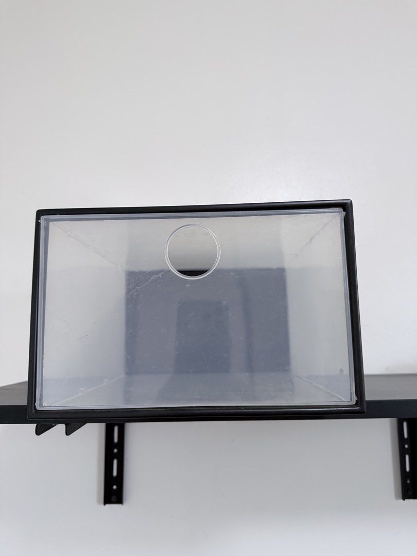 Clear Plastic Shoe Storage Box with Black Frame (Category: Storage Boxes & Baskets) located in Quezon City. Submitted by yourprelovedhub (Listing ID 1468557861, Image 2). Description: - Drop-front door with clear plastic for easy viewing - Sturdy black frame with built-in ventilation hole - Stackable design to save space and organize shelves - Dust-proof construction keeps footwear clean - Clean minimalist look perfect for closets and entryways -