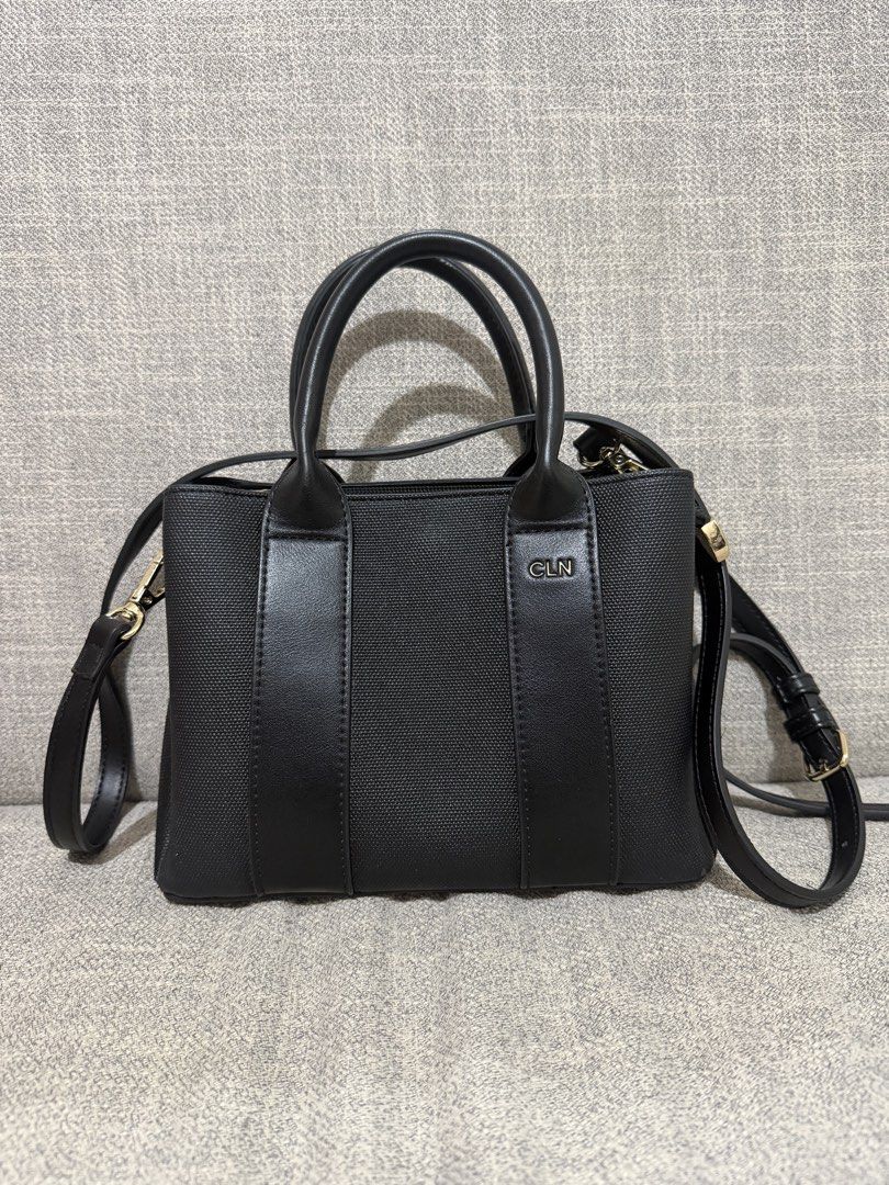 CLN Handbag with Strap (Category: Shoulder Bags) located in Pasig City. Submitted by lo_pernz (Listing ID 1468580669, Image 1). Description: Good as new Minor flaws but barely noticeable - Exterior of the bag (two small rips in the corner of bag - refer to the 3rd and 4th pictures) - A grayish scrape in the fabric - interior of the bag (5th pic).