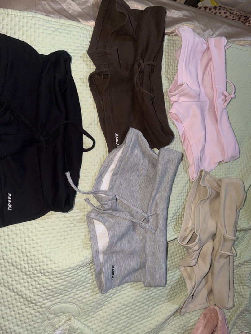 Clothes bundle!! (Category: Shorts) located in Singapore. Submitted by nicole2220 (Listing ID 1468630675, Image 5). Description: Size ranges from XS-M - Bundle of versatile everyday wear - 1 black short body con dress - 5 MABEAU lounge shorts (black, brown, grey, beige, pink) - 2 pairs of classic blue denim jeans - 2 sweet dresses (1 solid pink, 1 strawberry floral pattern) - 2 pairs of pajamas (pink, purple) - 2 skirts (grey, brown leopard) - As