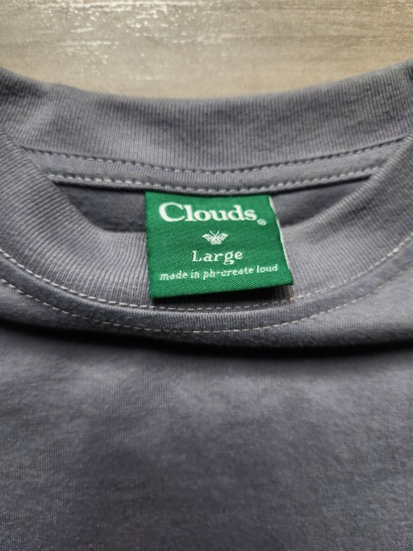 Clouds L/S Logo Shirt (Category: Tshirts & Polo Shirts ) located in Quezon City. Submitted by zero_two_seven (Listing ID 1468565125, Image 3). Description: - Brand: Clouds - Color: Gray - Size: L - 28.5 L x 24 W - Condition: 8/10 - Minimal Usage - Color may differ from the photos - Shipping fee is shouldered by the buyer.