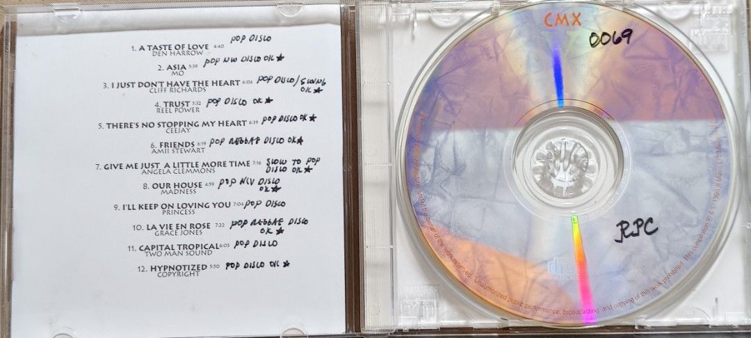 CMX X Compilation CD Album Pop Disco Tracks (Category: CDs & DVDs) located in Manila. Submitted by ruelcabrer77078 (Listing ID 1468689367, Image 3). Description: - Compilation CD: CMX X featuring 12 tracks - Featured Artists: Den Harrow, Madness, Grace Jones, Two Man Sound, and more - Inclusions: Jewel case with custom tracklist insert - Condition: Disc features handwritten notes and markings - Perfect for retro music enthusiasts and collectors.