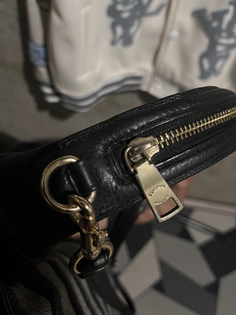 Coach Cross body Dome bag (Category: Luxury Bags & Wallets) located in Lopez. Submitted by goldenbird-0985 (Listing ID 1468634756, Image 3). Description: No issue on leather Only issue is minimal Brass fadings Still at a prestine condition.