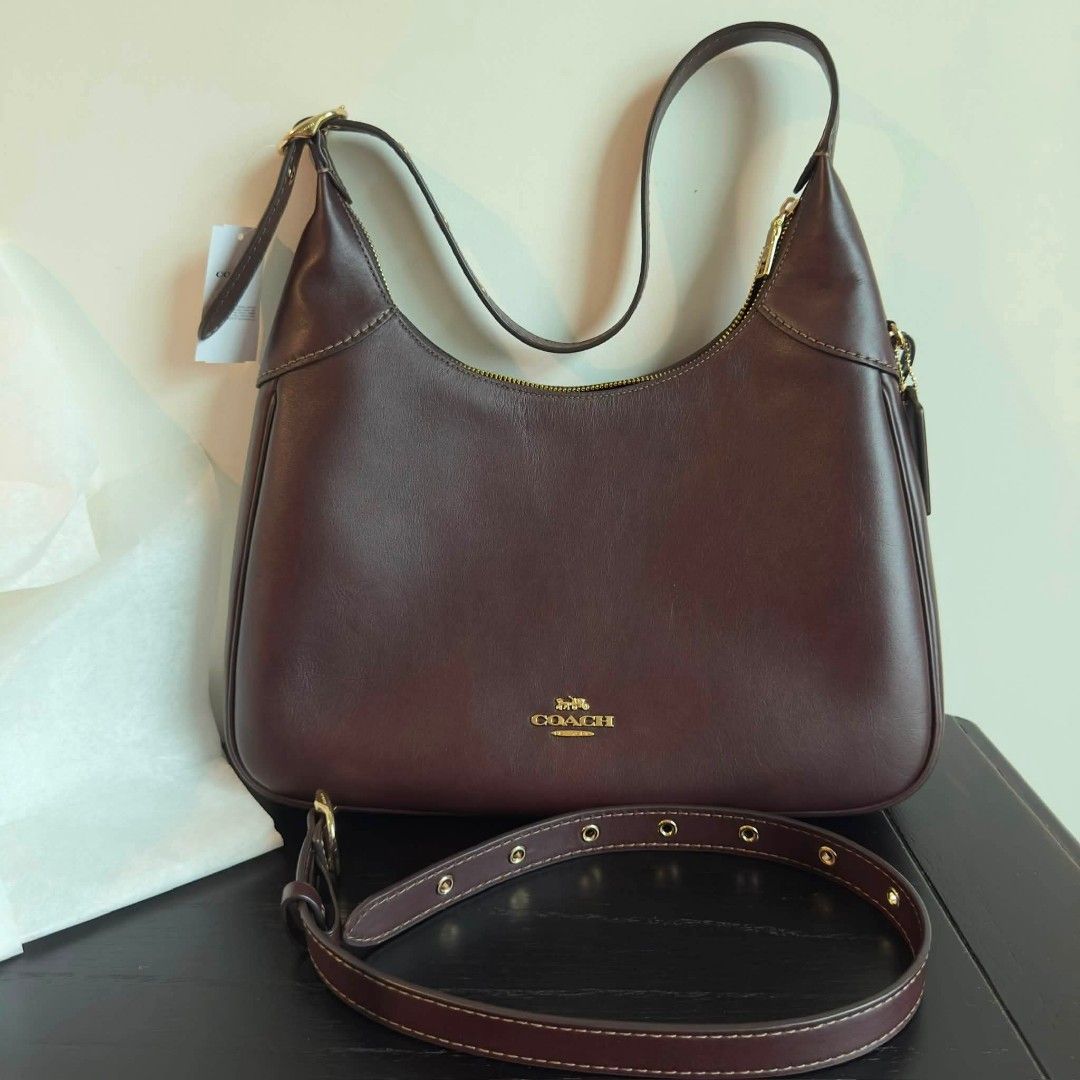 Coach Ella Shoulder Bag (Category: Luxury Bags & Wallets) located in Tarlac. Submitted by camssyyyyy (Listing ID 1468711208, Image 1). Description: Coach Ella Shoulder Bag -bnew -color espresso ( i think sold out na tong color na'to sa outlet) - guaranteed original (from US outlet) -comes with a paper bag, care card, tag and original dust bag (again, outlet bags don't have dust bags. I bought it separately because I want to preserve my bag when I