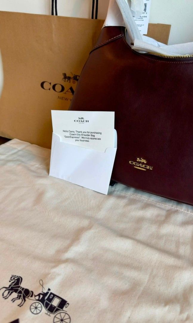 Coach Ella Shoulder Bag (Category: Luxury Bags & Wallets) located in Tarlac. Submitted by camssyyyyy (Listing ID 1468711208, Image 2). Description: Coach Ella Shoulder Bag -bnew -color espresso ( i think sold out na tong color na'to sa outlet) - guaranteed original (from US outlet) -comes with a paper bag, care card, tag and original dust bag (again, outlet bags don't have dust bags. I bought it separately because I want to preserve my bag when I