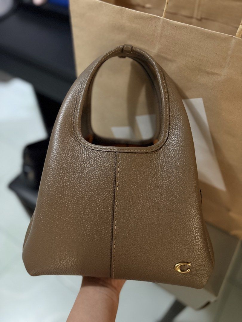 Coach Lana 23 in Dark Stone (Category: Luxury Bags & Wallets) located in Bulacan. Submitted by eloisereyes (Listing ID 1468516752, Image 1). Description: - Authentic Coach handbag in a chic taupe pebbled leather - Effortlessly fits your phone, keys, cards, and daily essentials - Clean and well-maintained condition - Comes with dust bag, original paper inserts - With cross body strap - pm na lang for more pics - we can also transact sa Fb for secu