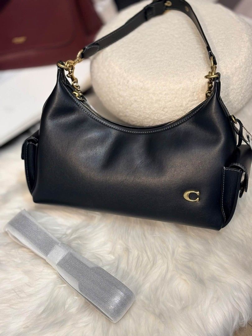Coach Pocket Juliet 30 in Black (Category: Shoulder Bags) located in Quezon City. Submitted by bagsboutiqueph (Listing ID 1468667611, Image 2). Description: LAST PRICE POSTED. LIMITED STOCKS! BRANDNEW WITH INCLUSIONS. COLOR MAY SLIGHTLY VARY IN ACTUAL DUE TO LIGHTING AND CAMERA SETTING. OTHER PHOTOS WILL BE SEND DURING PURCHASE AND FOR SURE BUYERS ONLY. WHEN IN DOUBT, DO NOT ORDER. THANK YOU..