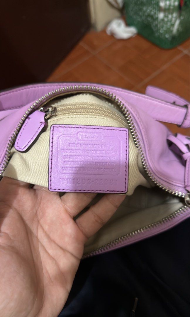 COACH PURPLE PINK BAG (Category: Shoulder Bags) located in Manila. Submitted by urban.vintage (Listing ID 1468617656, Image 3). Description: ISSUE: SEE THE PICS FOR ISSUE (NEED WASH) MOP :GCASH (NO COD) SHIP VIA: LALAMOVE & J&T LOCATION: PASIG CITY NEGOTIABLE INCLUDES LONGSTRAP / CHARM.
