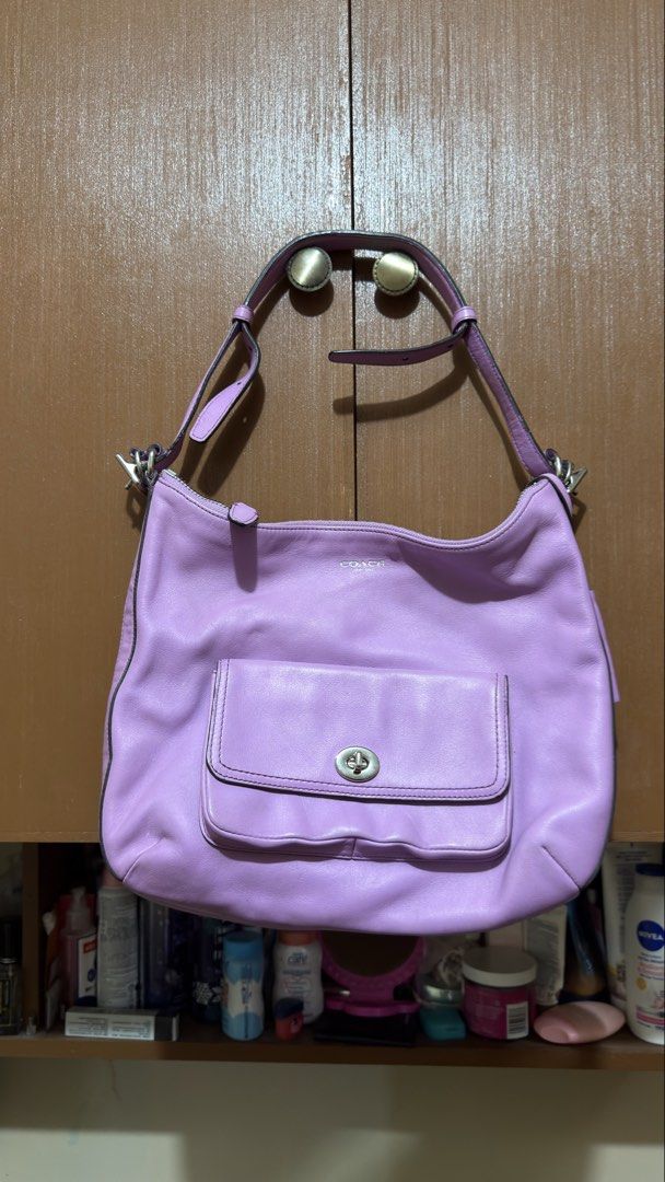 COACH PURPLE PINK BAG (Category: Shoulder Bags) located in Manila. Submitted by urban.vintage (Listing ID 1468617656, Image 1). Description: ISSUE: SEE THE PICS FOR ISSUE (NEED WASH) MOP :GCASH (NO COD) SHIP VIA: LALAMOVE & J&T LOCATION: PASIG CITY NEGOTIABLE INCLUDES LONGSTRAP / CHARM.