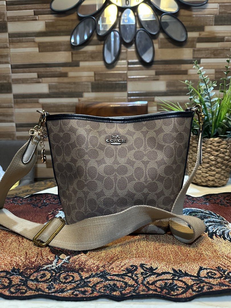 Coach Signature Monogram Bucket Bag with Webbing Strap (Category: Luxury Bags & Wallets) located in Caloocan City. Submitted by kristel3094 (Listing ID 1468656929, Image 1). Description: Nice♥️.