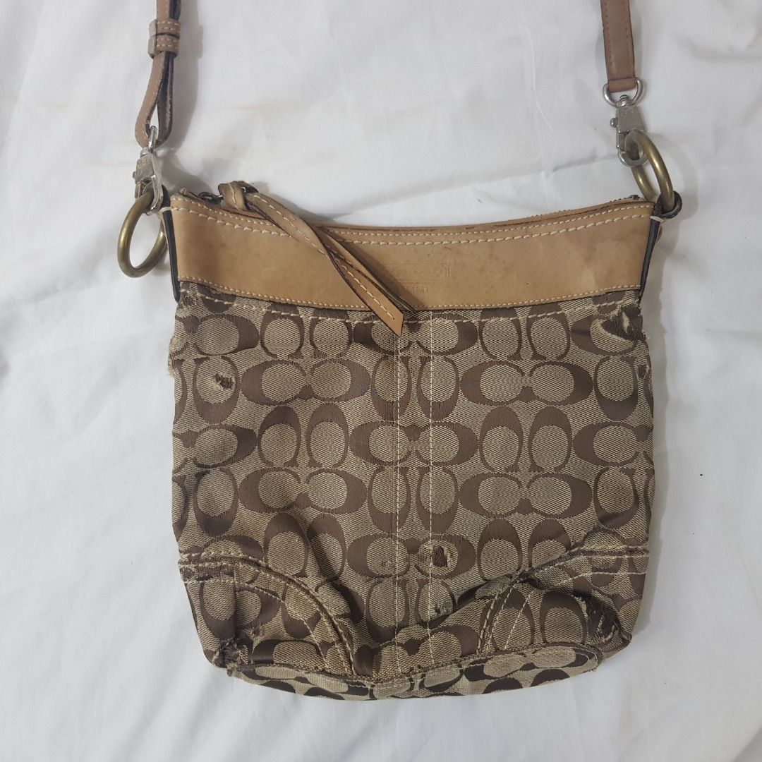 Coach sling bag (Category: Cross-body Bags) located in Cebu City. Submitted by dwightmendozasr (Listing ID 1468691811, Image 2). Description: Coach sling bag W- 10.0 L - 10.0 ~tiny fabric shallow tears Php 150.00 + shipping fee CODE: OO5.