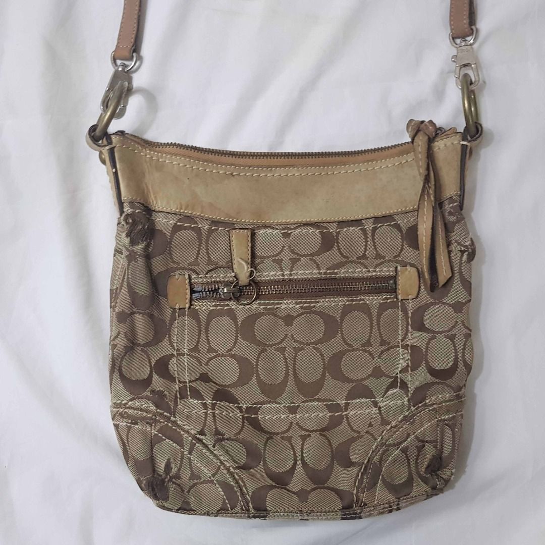 Coach sling bag (Category: Cross-body Bags) located in Cebu City. Submitted by dwightmendozasr (Listing ID 1468691811, Image 3). Description: Coach sling bag W- 10.0 L - 10.0 ~tiny fabric shallow tears Php 150.00 + shipping fee CODE: OO5.