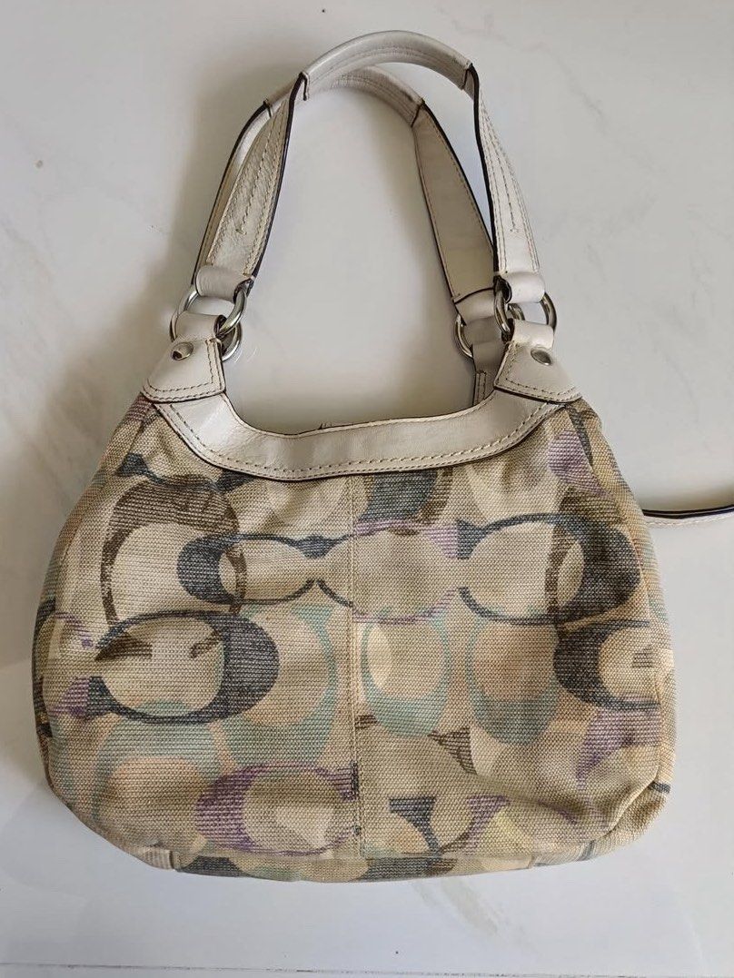 Coach Soho Lynn (Category: Shoulder Bags) located in Bayombong. Submitted by declutterbyriri (Listing ID 1464945460, Image 2). Description: real main character energy in a small size! may light natural aging sa white leather parts (adds to the authentic vintage look!) but no major flaws.