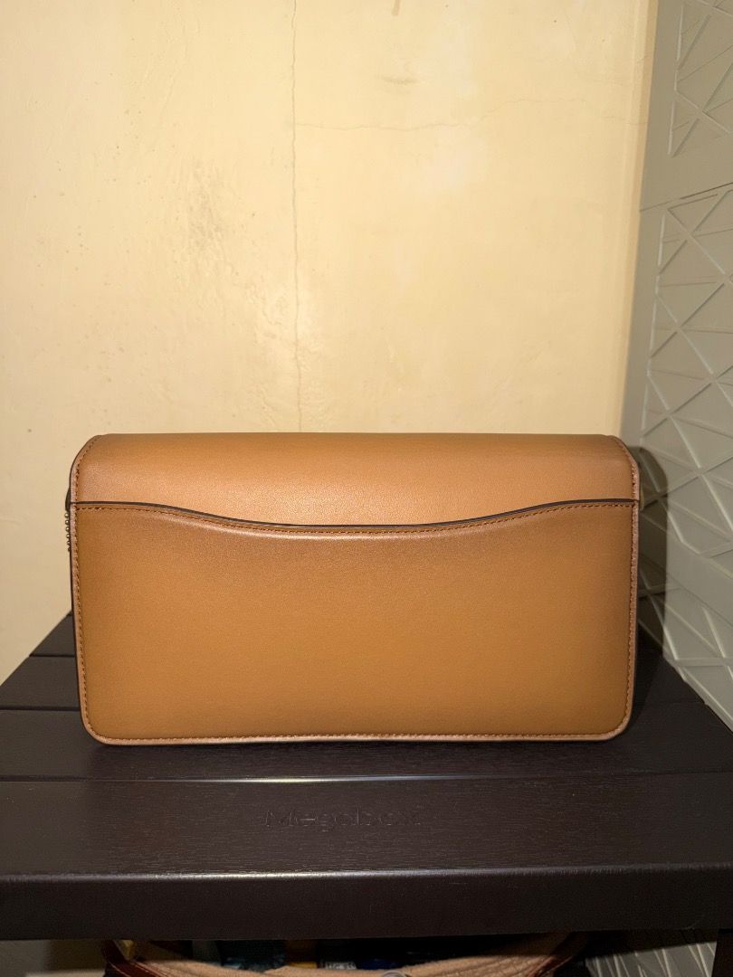 Coach Tabby 26 in Honey Brown (Category: Luxury Bags & Wallets) located in Santo Tomas. Submitted by ayemchad (Listing ID 1468609486, Image 2). Description: Coach Tabby 26, Honey Brown color. Purchased online in Japan, Coach Reserve. Di ko pa nagamit since purchase, but I have to sell na because I’ll be working abroad. And I won’t be able to bring most of my bags. Comes with; - all the paper works - Online Order Receipt - Paper Bag - Two dust bag