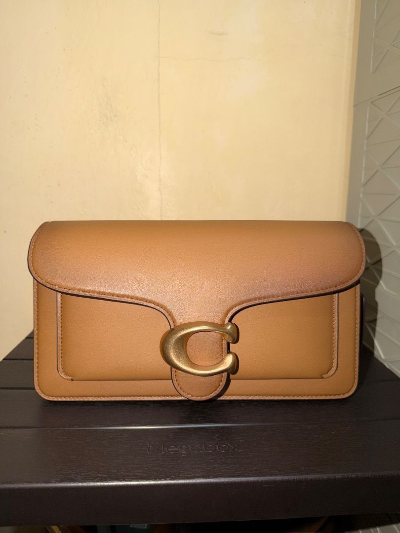 Coach Tabby 26 in Honey Brown (Category: Luxury Bags & Wallets) located in Santo Tomas. Submitted by ayemchad (Listing ID 1468609486, Image 1). Description: Coach Tabby 26, Honey Brown color. Purchased online in Japan, Coach Reserve. Di ko pa nagamit since purchase, but I have to sell na because I’ll be working abroad. And I won’t be able to bring most of my bags. Comes with; - all the paper works - Online Order Receipt - Paper Bag - Two dust bag