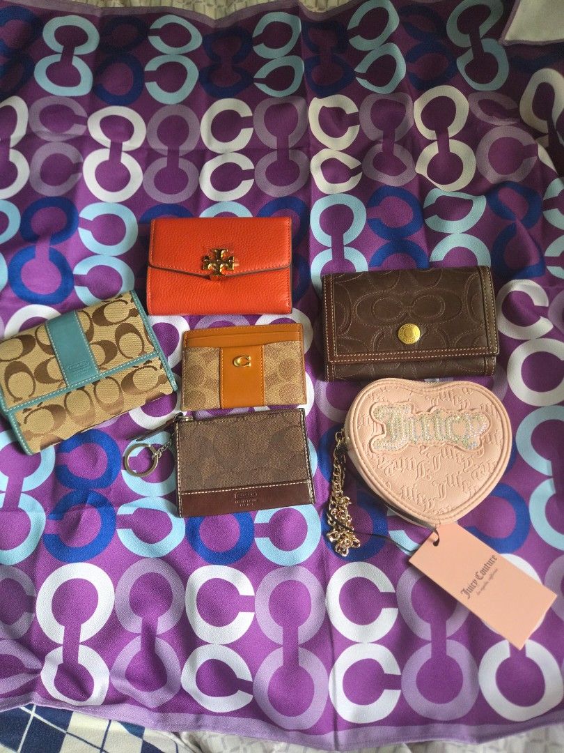 Coach wallet medium (Category: Wallets & Card holders) located in Manila. Submitted by vanch0304 (Listing ID 1468520041, Image 1). Description: Collection of branded wallets and card holders featuring Coach, Tory Burch, and Juicy Couture. Includes various styles from card cases to fold-over wallets, plus a brand new pink heart Juicy Couture pouch with tags. Perfect for upgrading your small leather goods. pm for details .