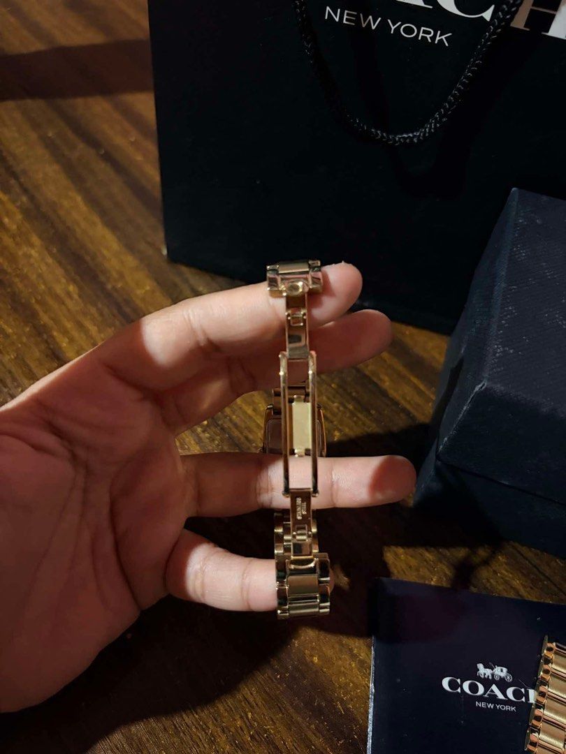 Coach Watch (Category: Luxury Watches) located in Pasig City. Submitted by madiscarte.ph (Listing ID 1468615704, Image 3). Description: Coach Womens Watch LN but missing one stone Complete w tag cc box paperbag and receipt. Selling loow Ww on last photo.