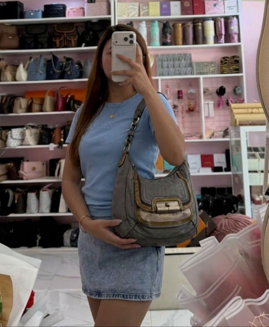 Coach Y2K Leather Hobo Bag (Category: Luxury Bags & Wallets) located in Bacolod. Submitted by lux.antithrifts (Listing ID 1468646265, Image 2). Description: Brand & Silhouette: Vintage Coach slouchy shoulder/hobo bag. Materials & Textures: Main Body: Soft, supple grey leather. Trim Accents: Embossed faux-crocodile leather lower panel with olive/tan glossy patent leather piping and suede border framing. Hardware & Closure: Heavy brushed nickel/sil