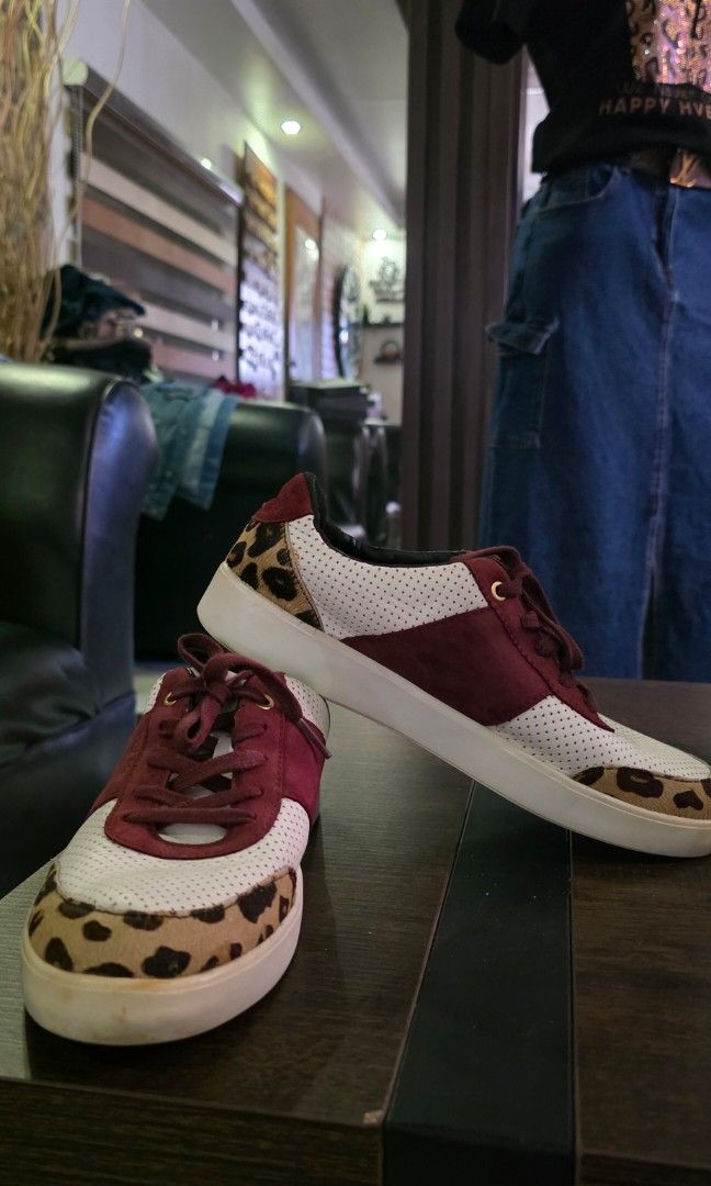 Cole Haan sneakers (Category: Sneakers) located in Apalit. Submitted by mjtwicedstyle_de_ap (Listing ID 1468547193, Image 3). Description: Preloved Authentic Cole Haan Grand Crosscourt Street Lace-Up Sneakers in an ivory perforated and burgundy leather design with leopard print accents. in very good usable condition size 7.