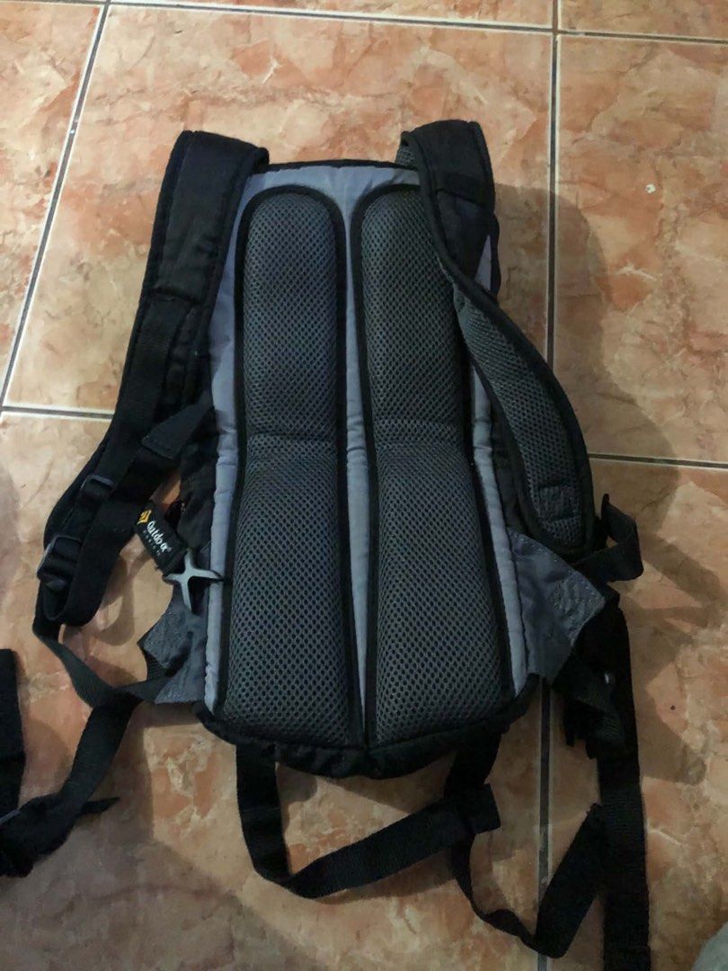 Columbia Titanium Hiking Backpack (Category: Backpacks) located in Manila. Submitted by yanacies (Listing ID 1468663985, Image 2). Description: - Brand: Columbia Titanium - Colorway: Brown, green, and orange with vibrant orange trim - Design: Multiple zipped compartments and front pocket labeled HIKING - Comfort: Padded mesh back panel, adjustable shoulder straps, and supportive waist belt - Ideal for: Outdoor trips, day hikes, and travel gear - 