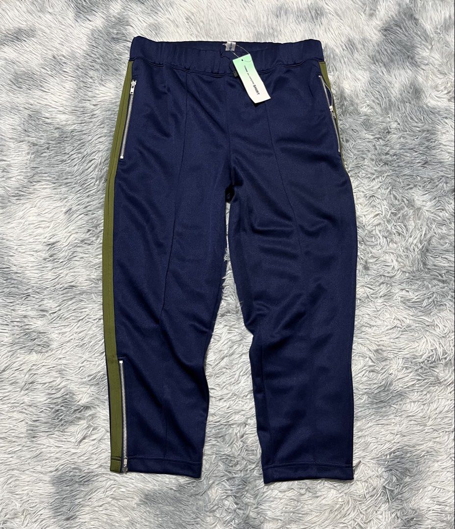 COMME des GARCONS Side Stripe Track Pants (Category: Joggers) located in Sasmuan (Sexmoan). Submitted by winterclothes.ph (Listing ID 1468518653, Image 1). Description: COMME des GARCONS Side Stripe Track Pants S on tag Waist 30-34 Length 33 Leg Opening 6.5 Excellent Condition.