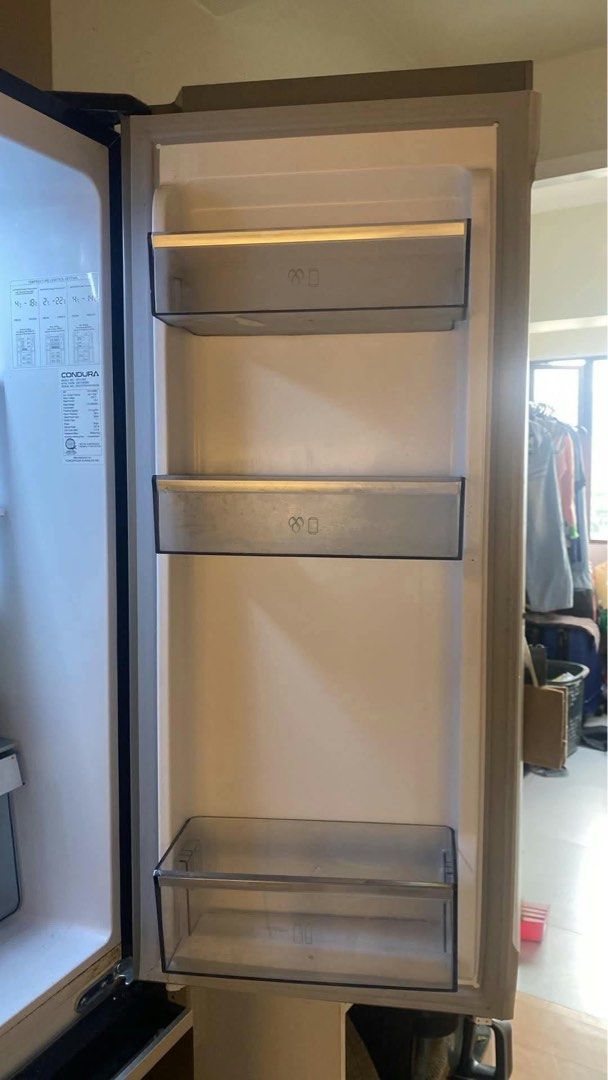 Condura refrigerator (Category: Refrigerators and Freezers) located in Manila. Submitted by ezrapaeste (Listing ID 1468602730, Image 2). Description: Move out sale Dimensions (L59.5 x W35.5 x H29.5in) made of glass and wood.