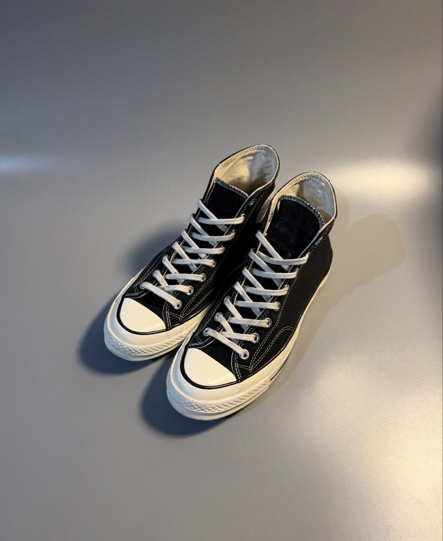 Converse Chuck 70 High Top Black Egret 8 (Category: Sneakers) located in Quezon City. Submitted by markieexp (Listing ID 1468659996, Image 2). Description: - Brand: Converse Chuck 70 High Top - Color: Classic Black with white laces - Size: Men's 8 / Women's 10 / UK 8 / EUR 41.5 - Condition: Clean soles with hardly any wear - Details: Iconic ankle patches and glossy vintage heel license plates - Style: Versatile everyday sneakers.