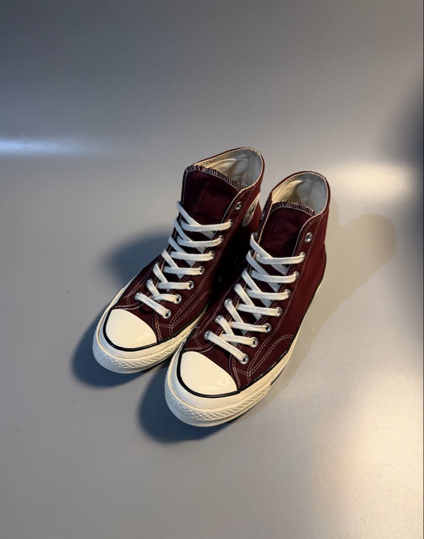 Converse Chuck 70 High Top Burgundy Maroon (Category: Sneakers) located in Caloocan City. Submitted by maempenafi21452 (Listing ID 1468654310, Image 2). Description: - Brand/Model: Converse Chuck 70 Vintage Canvas High Top - Color: Maroon Red with contrast white stitching and off-white soles - Size: US Men's 9.5 / Women's 11.5 (Style Code: 171567C) - Condition: Clean rubber outsoles with very minimal wear on the tread - Features: Metal eyelets, c