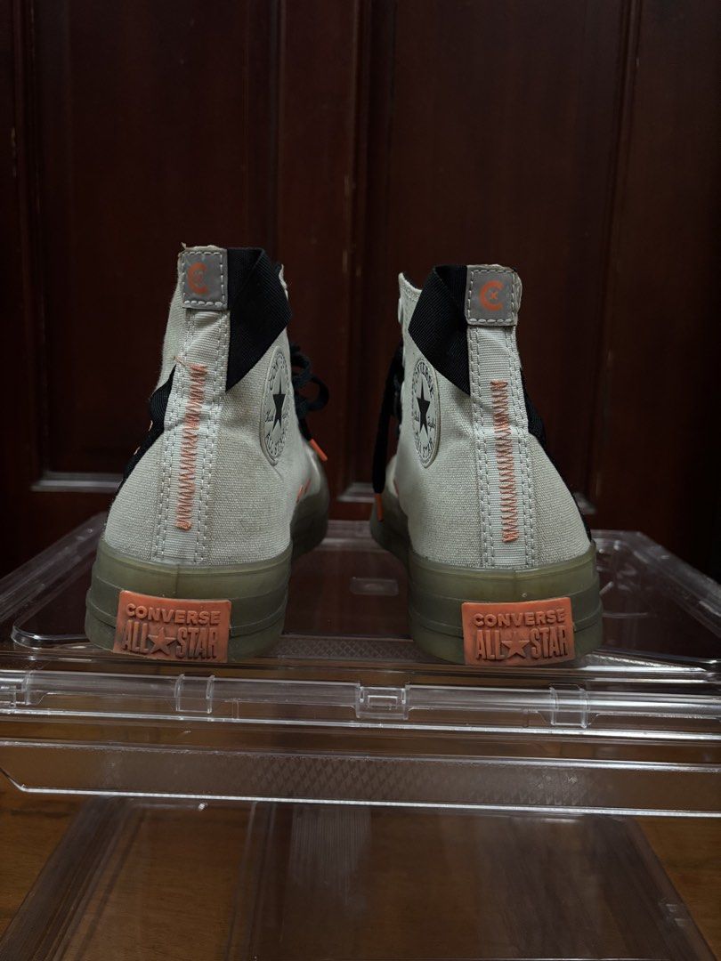 Converse Chuck Taylor All Star CX Stretch Canvas (Category: Sneakers) located in Makati City. Submitted by maleebooo (Listing ID 1468649435, Image 3). Description: - Color/Material: Light Silver / Black / Wild Mango colorway - Unique Details: Dark translucent soles and eye-catching orange stitching along the heel and heel tabs - Branding: Classic rubber All Star patches on inner ankles - Condition: Minor spots on canvas uppers; bottom treads show