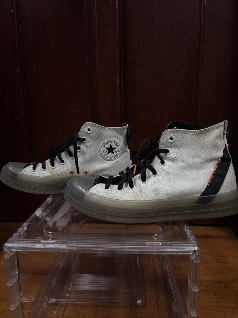Converse Chuck Taylor All Star CX Stretch Canvas (Category: Sneakers) located in Makati City. Submitted by maleebooo (Listing ID 1468649435, Image 2). Description: - Color/Material: Light Silver / Black / Wild Mango colorway - Unique Details: Dark translucent soles and eye-catching orange stitching along the heel and heel tabs - Branding: Classic rubber All Star patches on inner ankles - Condition: Minor spots on canvas uppers; bottom treads show