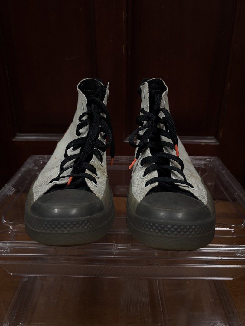 Converse Chuck Taylor All Star CX Stretch Canvas (Category: Sneakers) located in Makati City. Submitted by maleebooo (Listing ID 1468649435, Image 1). Description: - Color/Material: Light Silver / Black / Wild Mango colorway - Unique Details: Dark translucent soles and eye-catching orange stitching along the heel and heel tabs - Branding: Classic rubber All Star patches on inner ankles - Condition: Minor spots on canvas uppers; bottom treads show