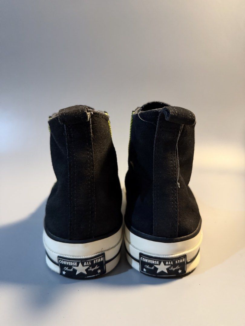 Converse Chuck Taylor All Star High Top Black (Category: Sneakers) located in Caloocan City. Submitted by maempenafi21452 (Listing ID 1468654972, Image 3). Description: - Brand: Converse Chuck Taylor High Top - Color: Black with neon yellow stitching and white toe cap - Size: Men's US 8 / Women's US 10 - Features: Classic tongue and heel branding, white laces, and rear pull tab for easy wear - Condition: Good, soles show light dirt from normal us