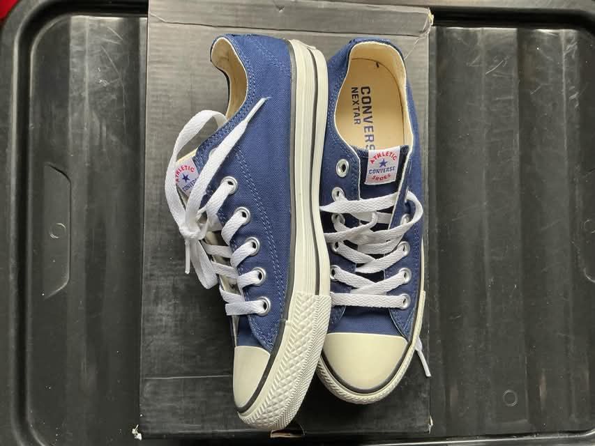 Converse Nextar Blue Low Top Sneakers (Category: Sneakers) located in Quezon City. Submitted by gabrilloaaaaaaa (Listing ID 1468705462, Image 2). Description: Converse Nextar canvas sneakers in blue. White laces and white rubber toe caps. Brown textured rubber outsoles with star patterns. Clean insoles marked Converse Nextar. Classic low top design with contrast stitching along the midsoles. Worn only a couple of times, clean soles and uppers wit