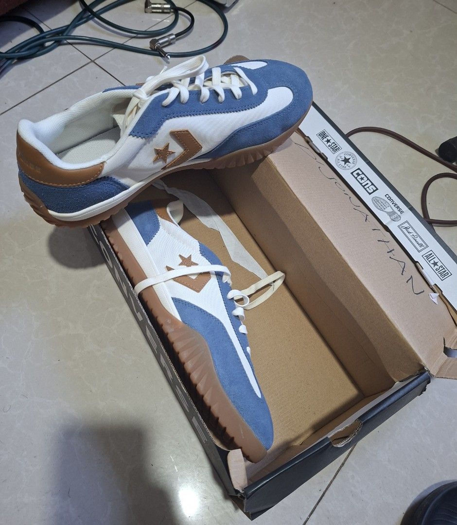 Converse Sneakers Blue White Size US 10 (Category: Sneakers) located in Manila. Submitted by djonathannagtalon-55936 (Listing ID 1468506328, Image 2). Description: - Brand: Converse - Color: Blue and white with brown leather accents - Size: US Men's 10 / UK 9 / EUR 44 - Features: Side star logo, heel tab, gum rubber ripple outsole, white laces - Inclusion: Original black Converse shoebox - Condition: Brand new/Mint (ready to wear) - Mode of Payme