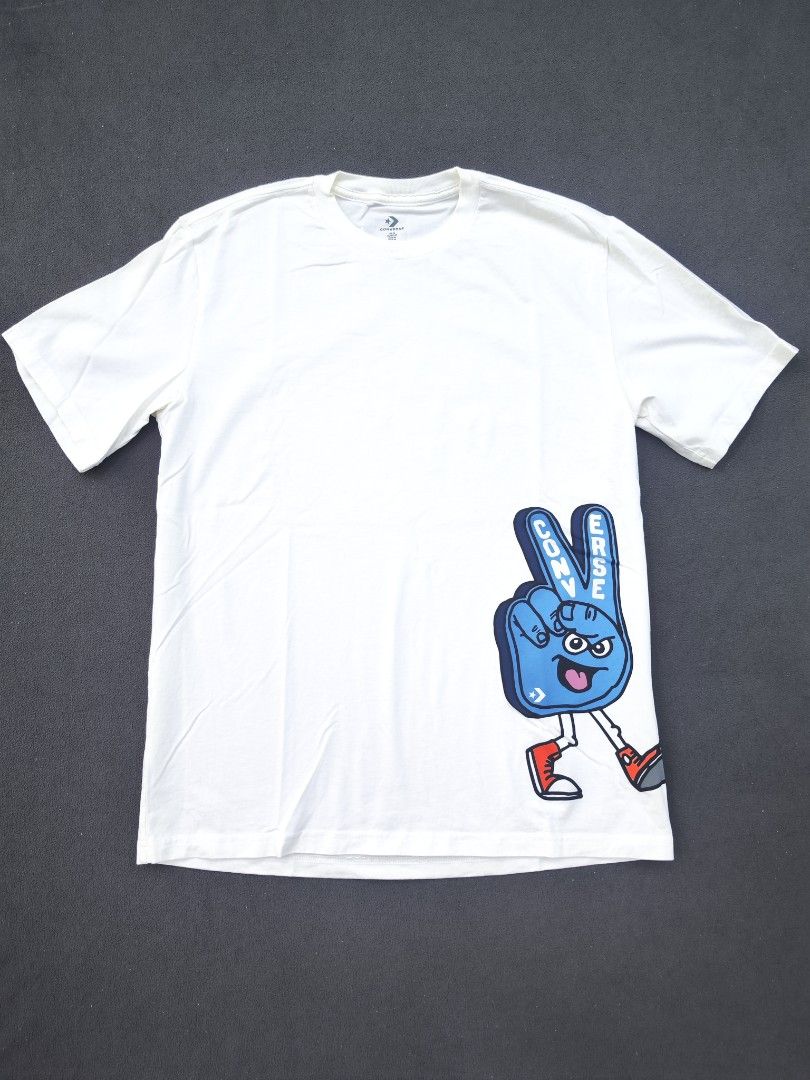 Converse Tee (Category: Tshirts & Polo Shirts ) located in Bulacan. Submitted by emilj23 (Listing ID 1468520516, Image 1). Description: Converse Tee Size M on tag L 27 W 20.5 Condition 9/10 Color rate 9/10 Issue Dot Stain.