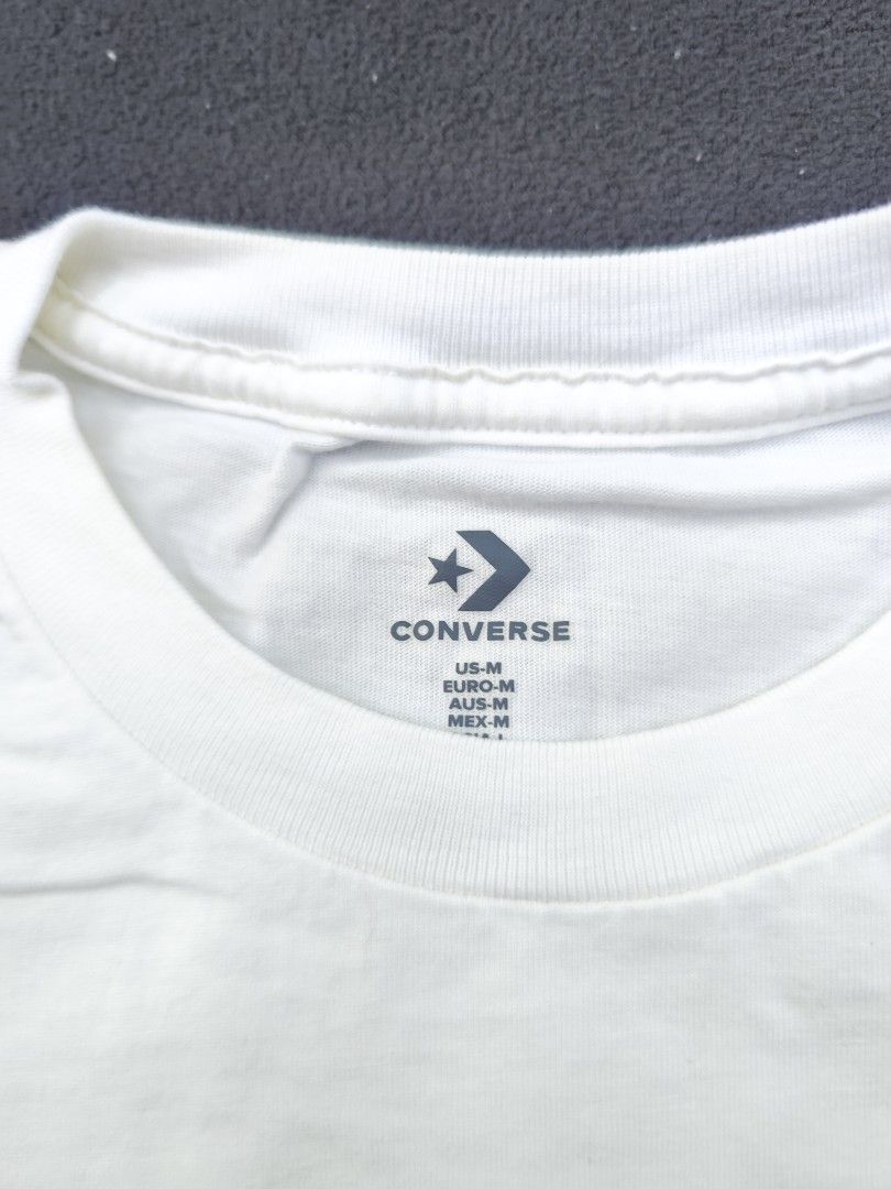 Converse Tee (Category: Tshirts & Polo Shirts ) located in Bulacan. Submitted by emilj23 (Listing ID 1468520516, Image 3). Description: Converse Tee Size M on tag L 27 W 20.5 Condition 9/10 Color rate 9/10 Issue Dot Stain.