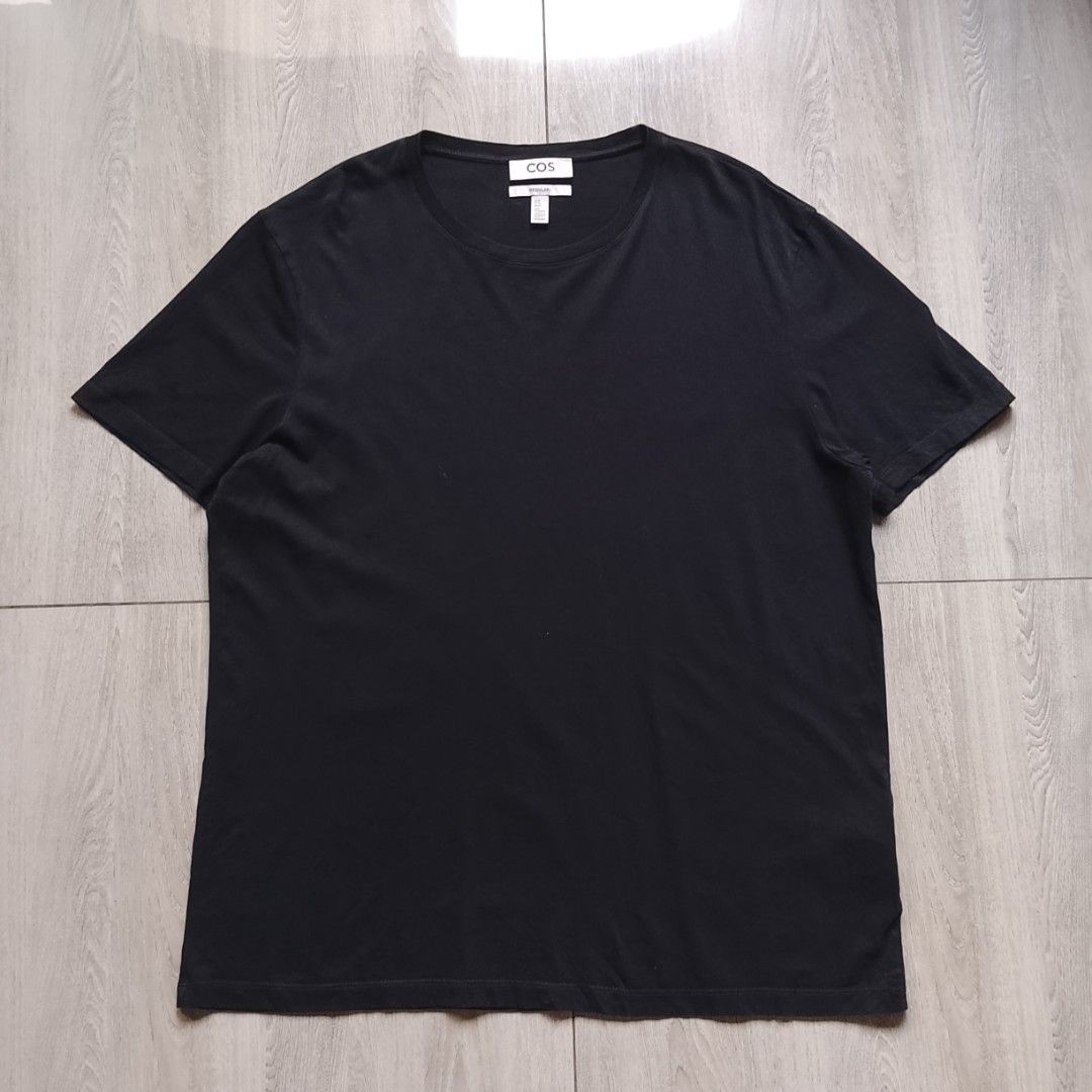 COS - Essential Plain Black Shirt (Category: Luxury Apparel) located in Angeles City. Submitted by sselects_ (Listing ID 1468515145, Image 1). Description: Details of the item: *Color may vary due to lighting Size: XL on tag Width: 22" Length: 27" Issue: small hole as seen on pic, NEEDS WASH Condition: Excellent ALL ITEMS ARE NEGOTIABLE.