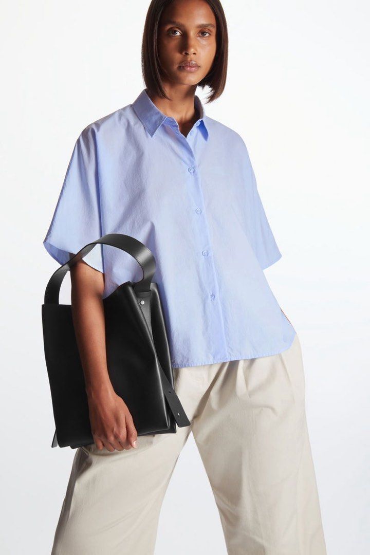 COS Buttondown Oversized Shirt (Category: Shirts) located in Mabalacat. Submitted by designerbrandsforless (Listing ID 1468593752, Image 1). Description: In great condition! Size:32 Shoulder: 14.75” Armpit 23” Length 22”.