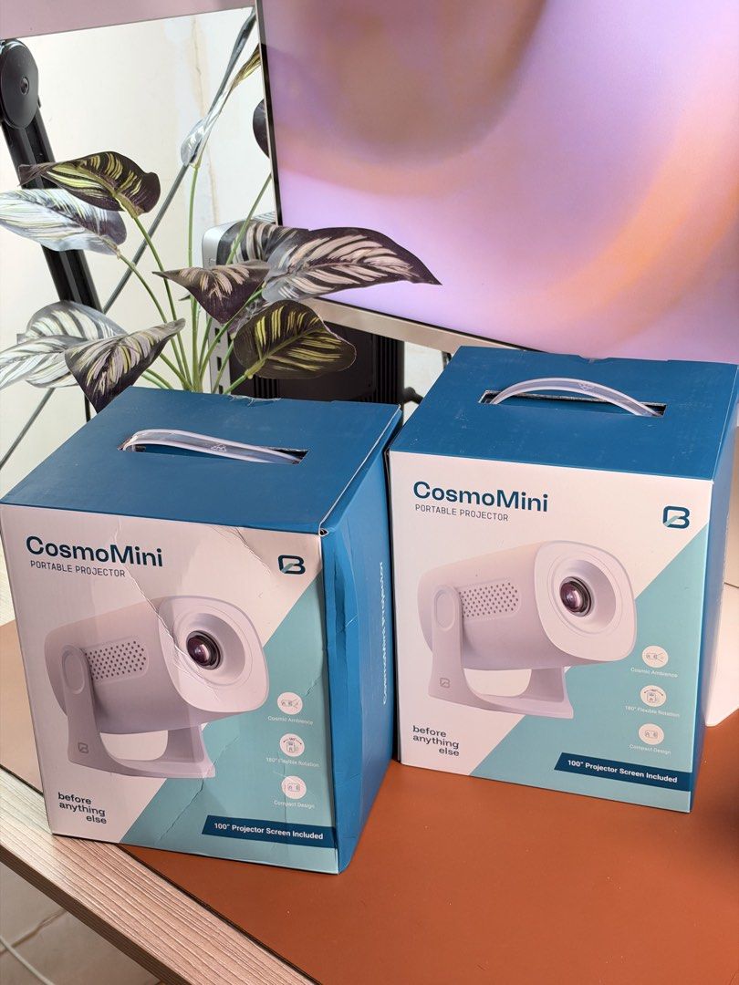 CosmoMini Portable Projector (Category: Projectors) located in Santa Cruz. Submitted by nisjohnnequinto (Listing ID 1468548609, Image 1). Description: - Product: CosmoMini Portable Projector - Features: 180-degree flexible rotation & cosmic ambience - Best For: Movie nights, gaming, and aesthetic room setups - Availability: 2 units available - Condition: Brand new in box 📱🔊 TECH ACCESSORIES CLEAROUT SALE | BRAND NEW & SEALED! 🎧⚡ All freebies f
