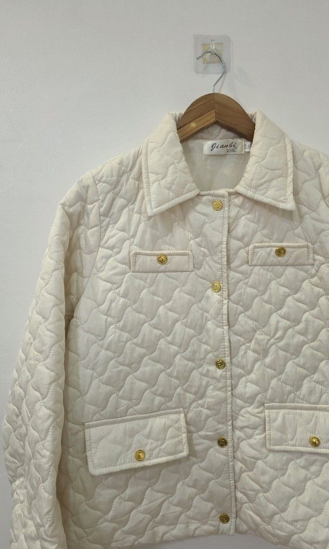 Cream Quilted Button-Up Jacket with Gold Buttons & Pockets (Category: Coats, Jackets and Outerwear) located in Antipolo. Submitted by chimmychoo (Listing ID 1468656229, Image 2). Description: THRIFTED 🌼 SIZE: S-M shoulders 15" width 21" length 23" Flaws: Stain.