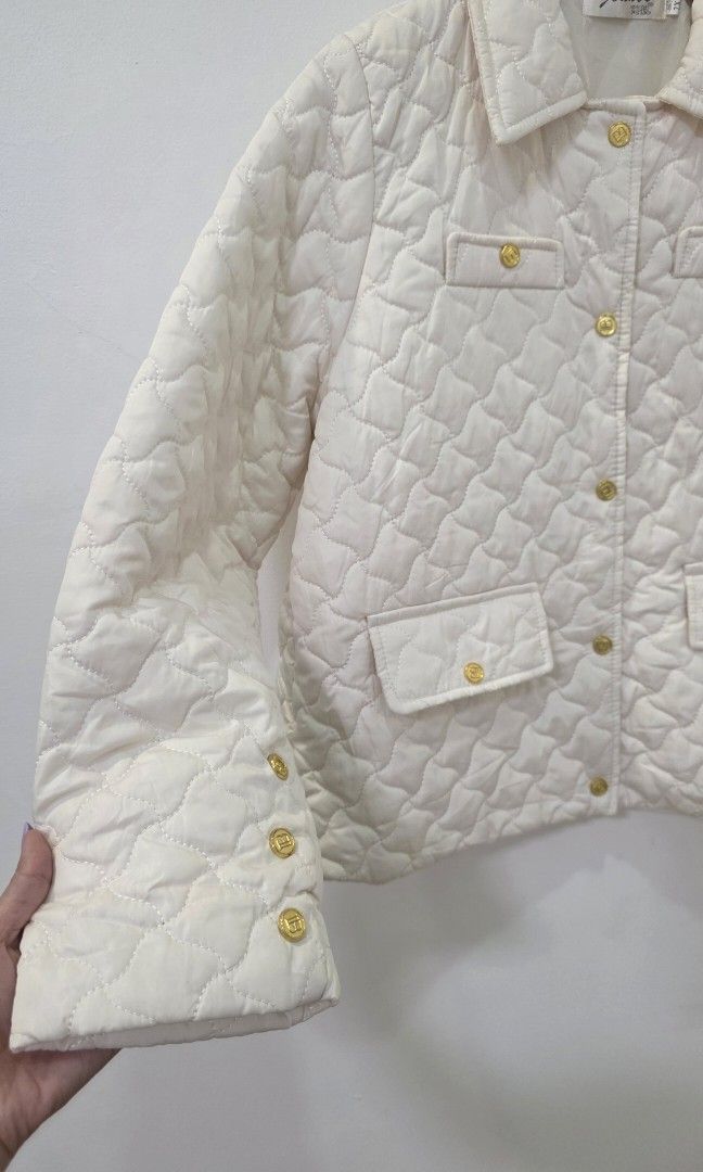 Cream Quilted Button-Up Jacket with Gold Buttons & Pockets (Category: Coats, Jackets and Outerwear) located in Antipolo. Submitted by chimmychoo (Listing ID 1468656229, Image 3). Description: THRIFTED 🌼 SIZE: S-M shoulders 15" width 21" length 23" Flaws: Stain.