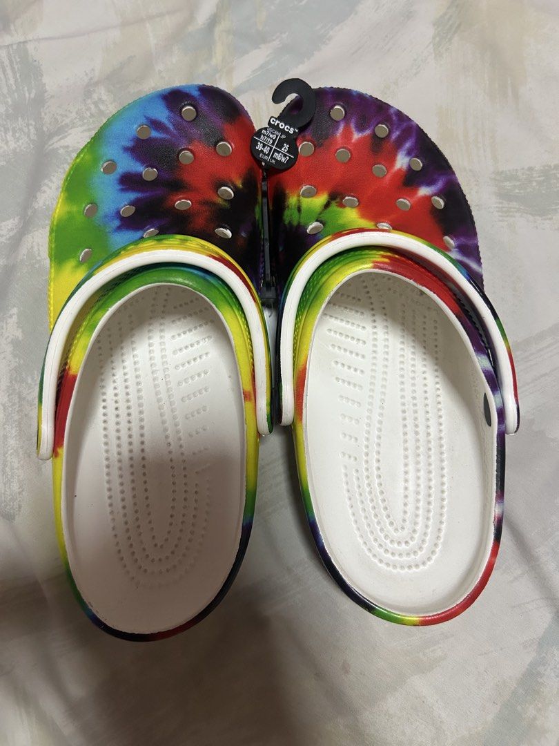 Crocs Tie Dye Clog Sandals (Category: Sandals) located in Manila. Submitted by ellajane_0508 (Listing ID 1468597139, Image 1). Description: - Brand new with original store tags attached - Fun, eye-catching multi-color tie-dye patterns - Iconic lightweight comfort for all-day wear - Ventilation ports add breathability and shed water - Pivoting heel straps for a more secure fit SIZE IS PROVIDED IN EACH PICTURE. PRICE IS NEGOTIABLE!!!!.