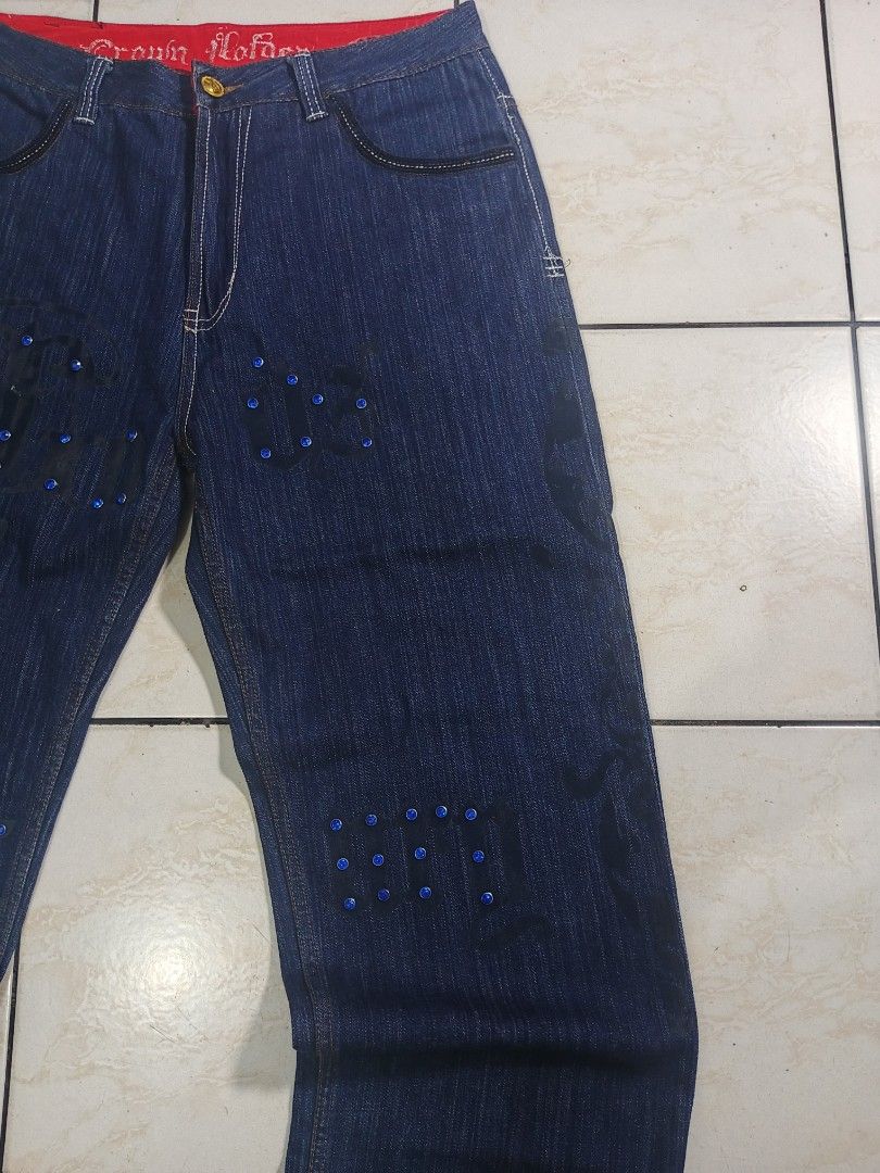 CROWN HOLDER PANTS (Category: Jeans) located in Taguig. Submitted by wst.fnds (Listing ID 1468687824, Image 2). Description: CROWN HOLDER GOOD CONDITION BAGGY / LOOSE ISSUE HEEL DRAG MISSING OTHER RHINESTONE CHECK ON PIC OTHER ISSUE W:34 / L:44.5 / T:13.5 / LO:9 💸: 899 Keywords: Southpole, Fubu, Karl kani, Rocawear, Evisu, Rmc, Ed Hardy, Sean John, Ecko Unltd, Coogi, Girbaud, Avirex, Ralph Lauren.