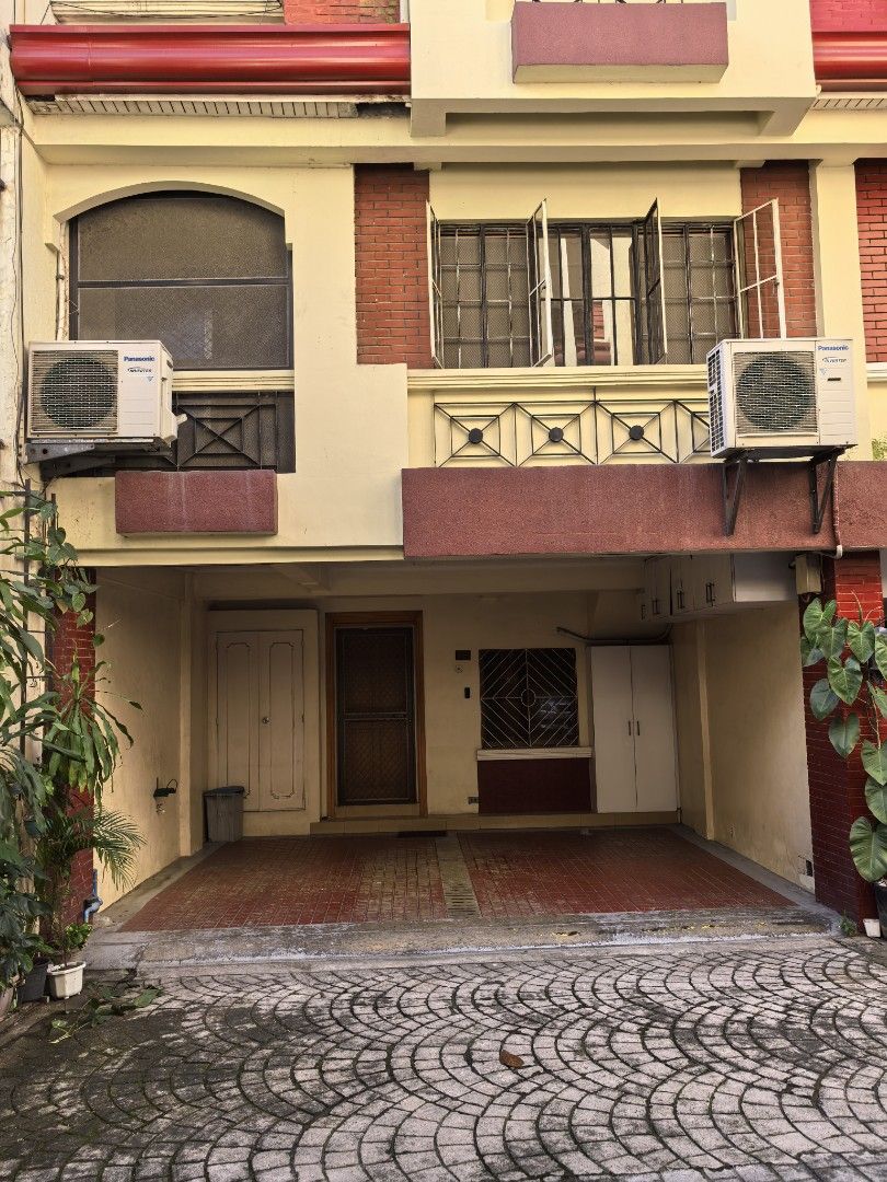 Cubao townhouse for rent (Category: Townhouse) located in Quezon City. Submitted by mwwmson (Listing ID 1468562831, Image 1). Description: - Multi-storey townhouse available for rent - Ready for occupancy with neutral painted walls - Ground floor covered carport - Panasonic inverter air conditioning units included - Ceramic tiled floors and elegant wooden staircase railings - Drop ceilings with modern recessed lighting - Windows equipped with sec