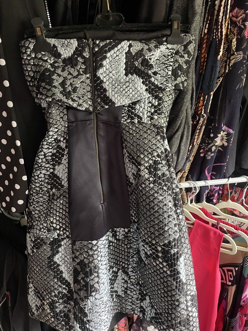 CUE Strapless Python Origami Dress (Category: Luxury Apparel) located in Dumaguete. Submitted by jaymharr (Listing ID 1468513062, Image 2). Description: Cue Strapless Python Origami Dress in a grey and black snakeskin print featuring a distinct structured bow detail across the bust and a solid black center panel..